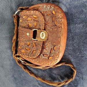 Vintage, hand stamped, leather with cut outs purse